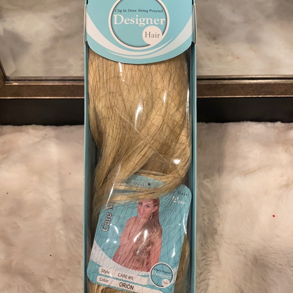 Clip in draw string ponytail extension